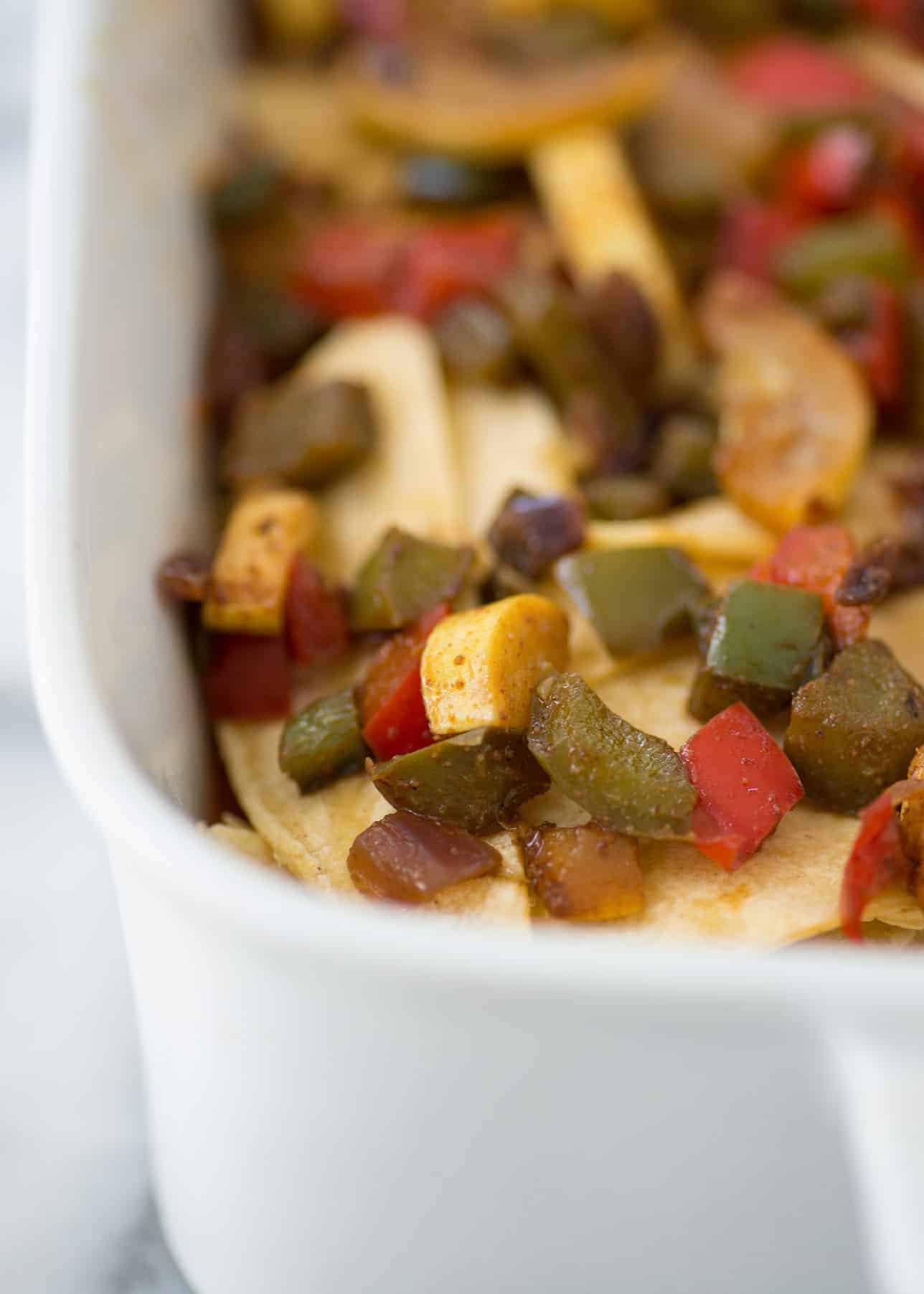 Vegetarian Enchilada Casserole 3 Late-Summer Vegetarian Enchilada Casserole. Layers Of Corn Tortillas, Homemade Enchilada Sauce, Peppers, Squash And Cheese. Vegetarian &Amp; Gluten-Free | Www.delishknowledge.com