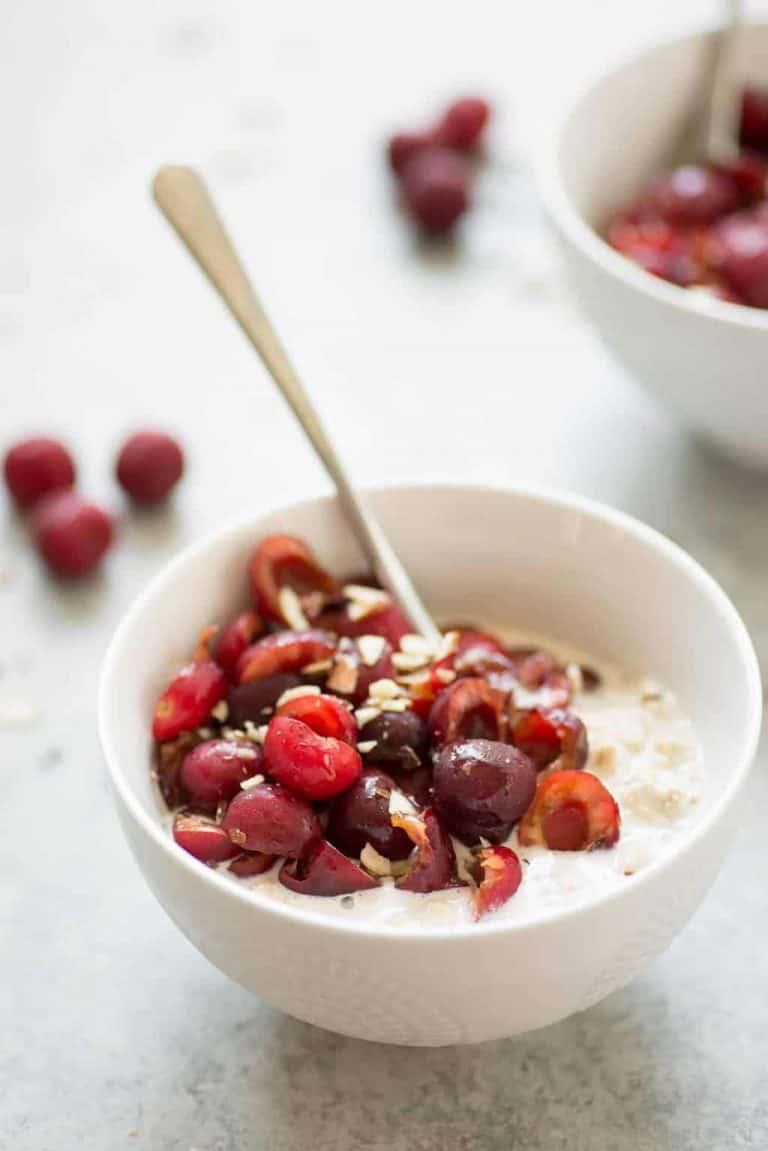 Lavender Cherry Overnight Oats! This Breakfast Is So Unique And Delicious, A Must-Try With Fresh Cherries. Homemade Cashew-Lavender Milk With Oats, Cherries And Almonds. Vegan And Gluten-Free | Www.delishknowledge.com
