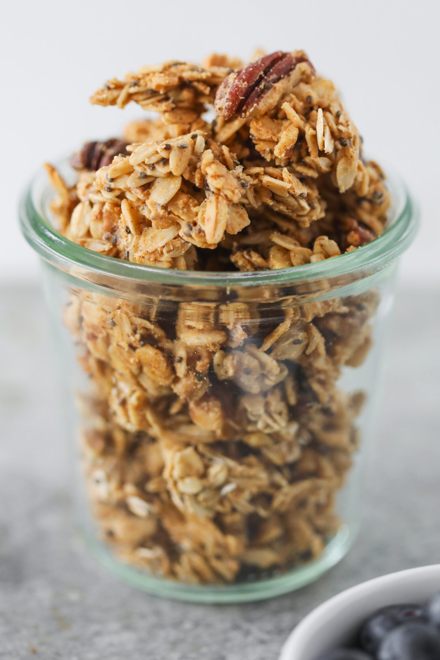 Low Sugar Granola With Big Clusters In A Glass Jar