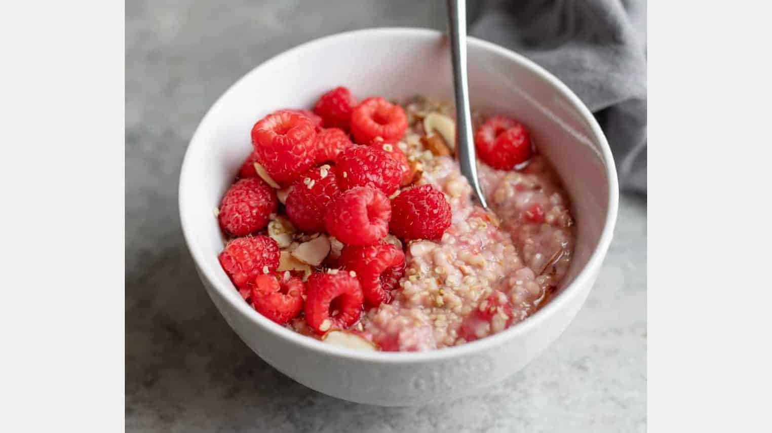 bowl of oatmeal with raspberries