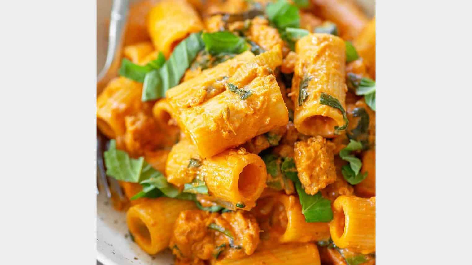 vegan pasta with sausage and aa creamy rigatoni sauce 