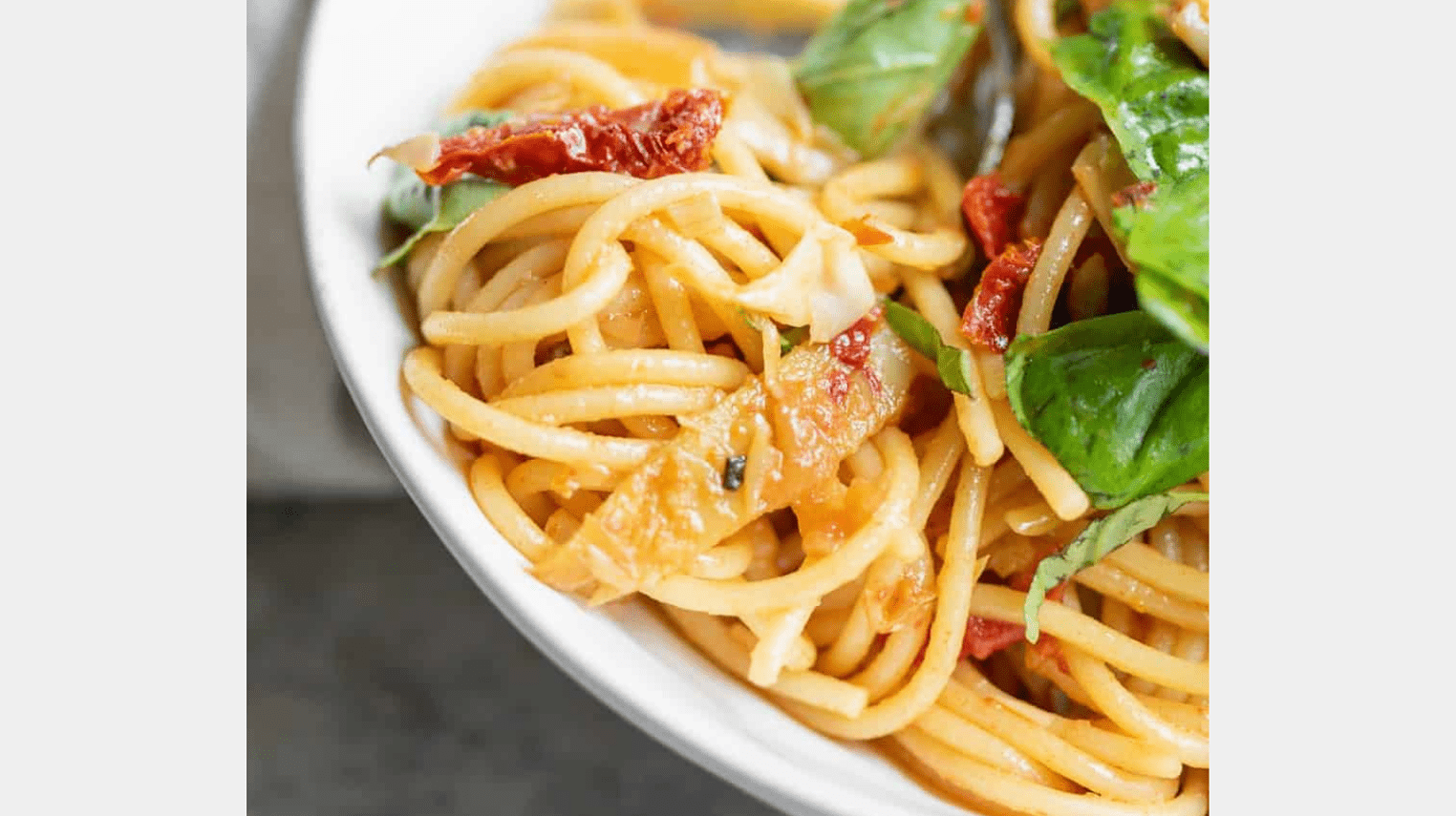 close up of spaghetti and artichokes