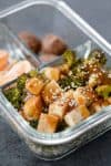 meal prep container with tofu and broccoli