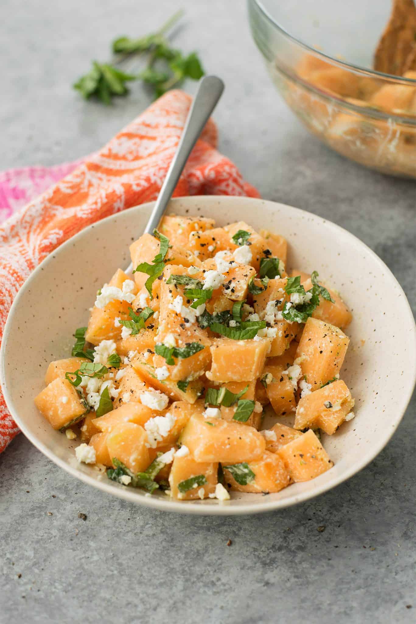 Melon, Mint And Feta Salad! This Is The Perfect Sweet And Salty Combination. Great Side-Dish For Summer, Potlucks And Cookouts. Cubes Of Melon, Feta, Mint And A Lime Dressing. Vegetarian And Gluten-Free. | Delishknowledge.com