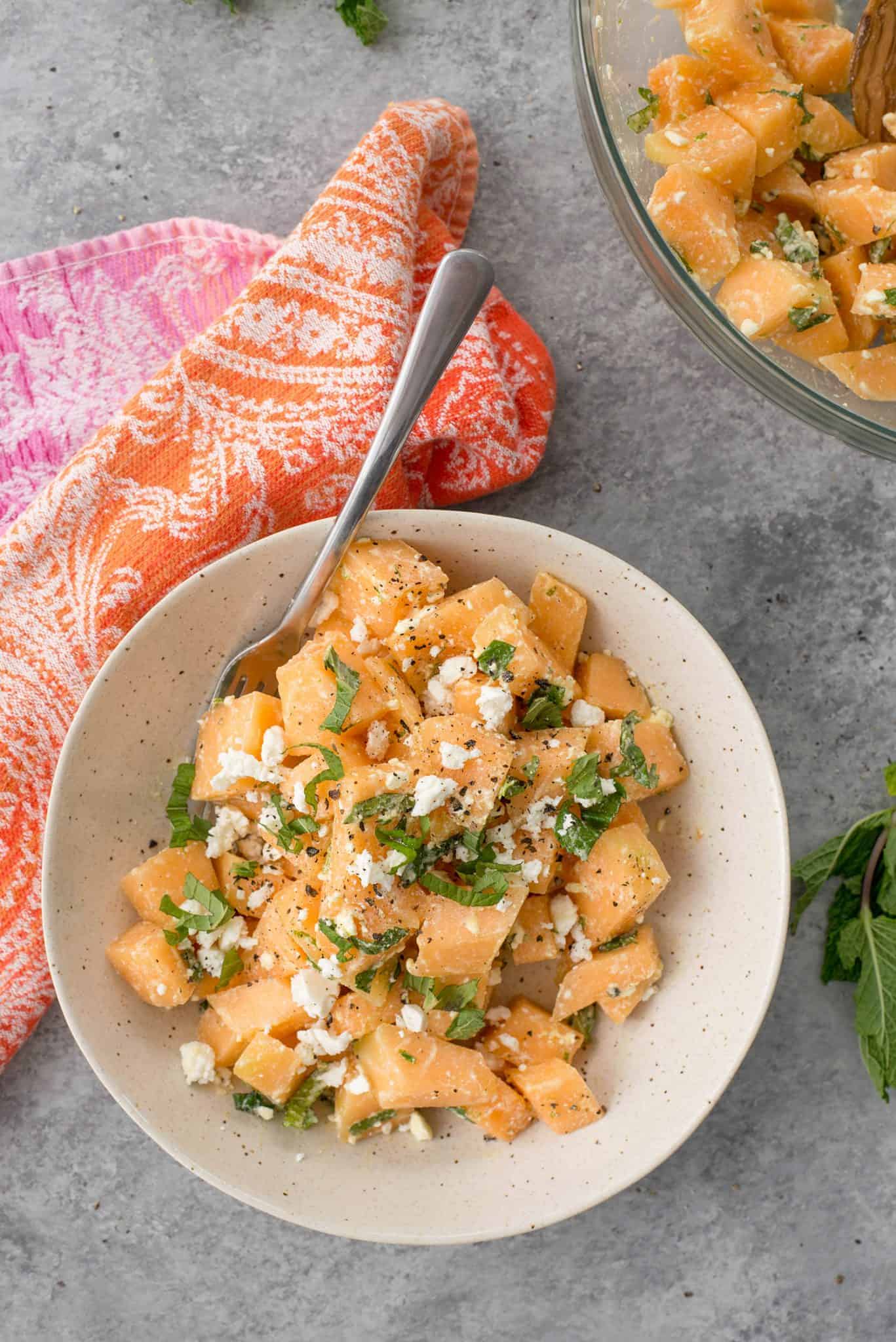 Melon, Mint And Feta Salad! This Is The Perfect Sweet And Salty Combination. Great Side-Dish For Summer, Potlucks And Cookouts. Cubes Of Melon, Feta, Mint And A Lime Dressing. Vegetarian And Gluten-Free. | Delishknowledge.com