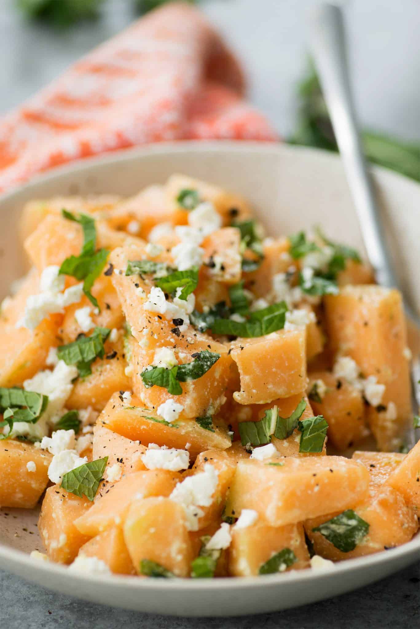 Melon, Mint And Feta Salad! This Is The Perfect Sweet And Salty Combination. Great Side-Dish For Summer, Potlucks And Cookouts. Cubes Of Melon, Feta, Mint And A Lime Dressing. Vegetarian And Gluten-Free. | Delishknowledge.com