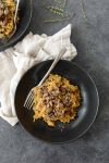Wild Mushroom Risotto! If you love risotto, you've gotta try this recipe. Homemade wild mushroom stock with crispy, thyme roasted mushrooms with creamy risotto. Vegetarian, easily vegan. | www.delishknowledge.com