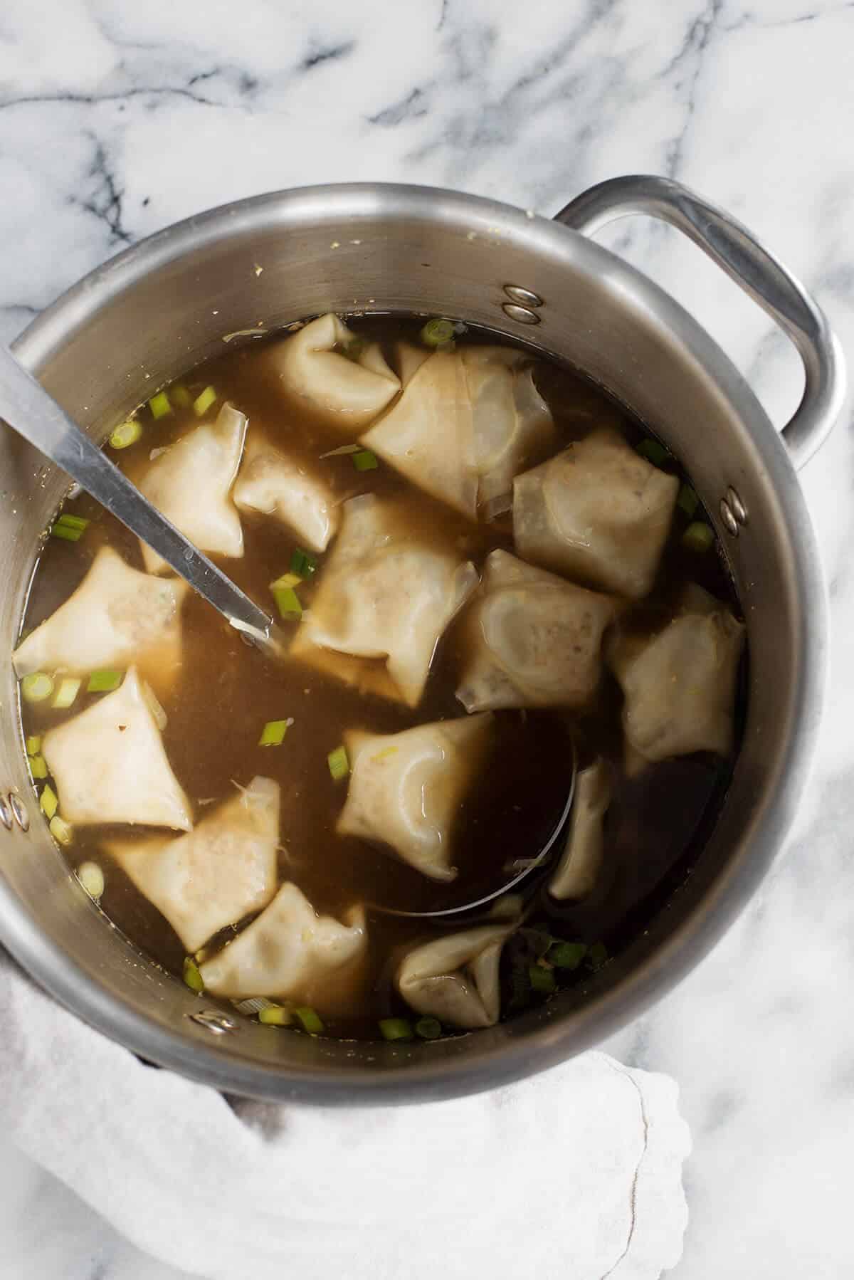 Mushroom Wonton Soup! Homemade Wontons With Mushrooms And Tofu Served In A Rich Mushroom Broth. A Vegetarian And Vegan Must! | Www.delishknowledge.com