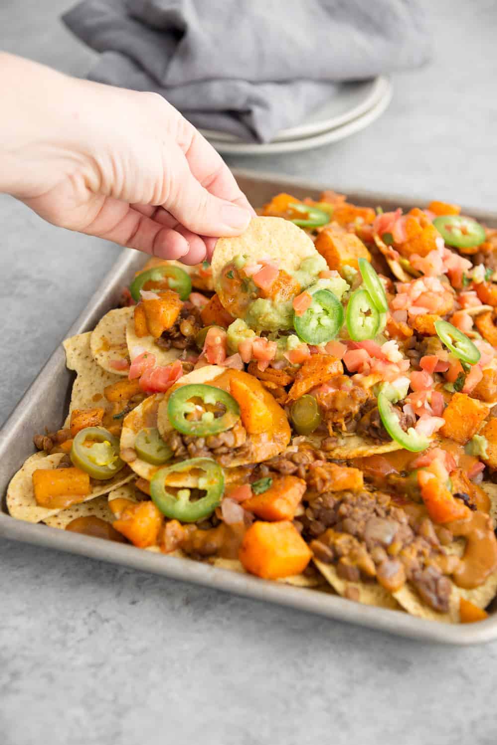 35 Easy Vegan Lentil Recipes 14 Vegan Lentil Nachos With Quick Cheese Sauce On Pan
