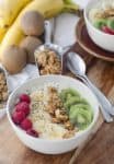 New Zealand Inspired Smoothie Bowls! Kiwi Vanilla Smoothie Bowls topped with Hokey Pokey Granola. A healthy breakfast, packed with almost 20 grams of protein. | www.delishknowledge.com