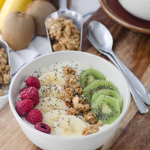 Kiwi Smoothie Bowl with Hokey Pokey Granola 5 New Zealand Inspired Smoothie Bowls! Kiwi Vanilla Smoothie Bowls Topped With Hokey Pokey Granola. A Healthy Breakfast, Packed With Almost 20 Grams Of Protein. | Www.delishknowledge.com