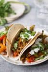Oven Roasted Fajitas! These veggie fajitas are such a simple meal. Throw everything in the oven and dinner is ready in just 30 minutes. Customize them however you like 'em. | www.delishknowledge.com