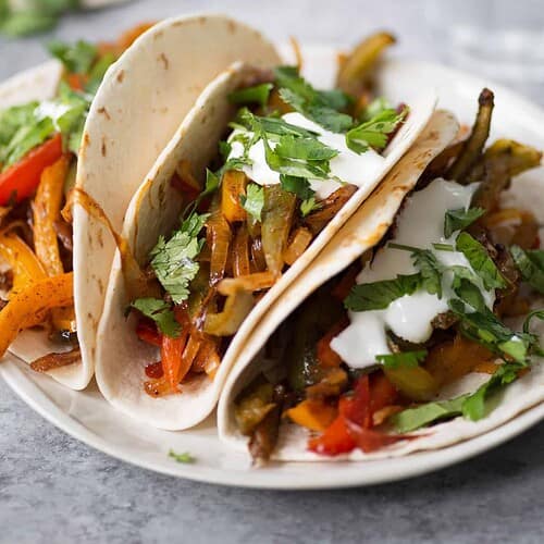 Oven Roasted Fajitas! These Veggie Fajitas Are Such A Simple Meal. Throw Everything In The Oven And Dinner Is Ready In Just 30 Minutes. Customize Them However You Like 'Em. | Www.delishknowledge.com