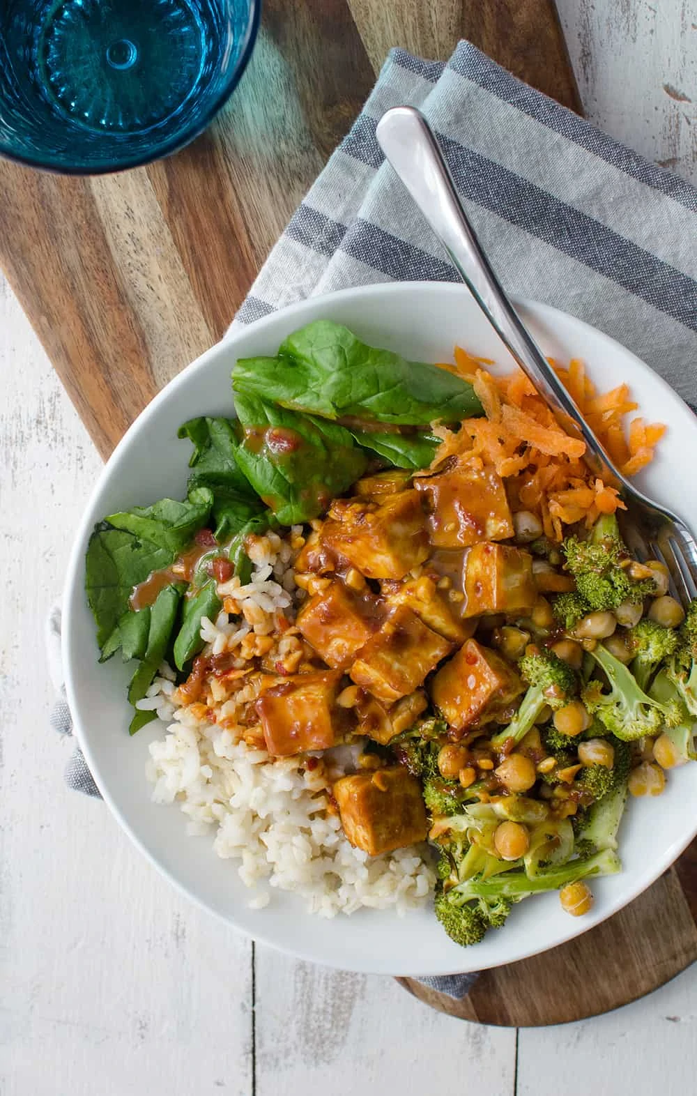 Peanut Tofu Buddha Bowl on serving board
