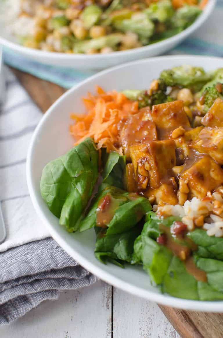 Peanut Tofu Buddha Bowl : Peanut Tofu Buddha Bowl - Delish Knowledge - Toss the sweet potatoes and onion on a large sheet pan with a tablespoon of oil and a sprinkle of salt and pepper.
