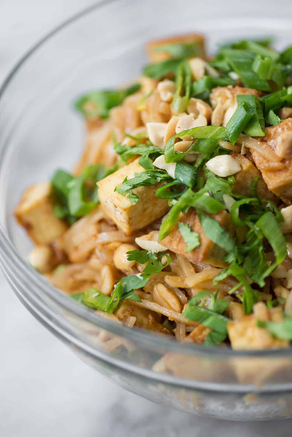 bowl of spicy peanut noodles and tofu