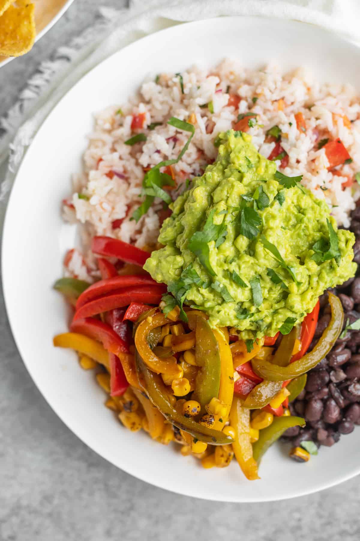 Bowl Of Rice With Pico De Gallo And Guacamole 