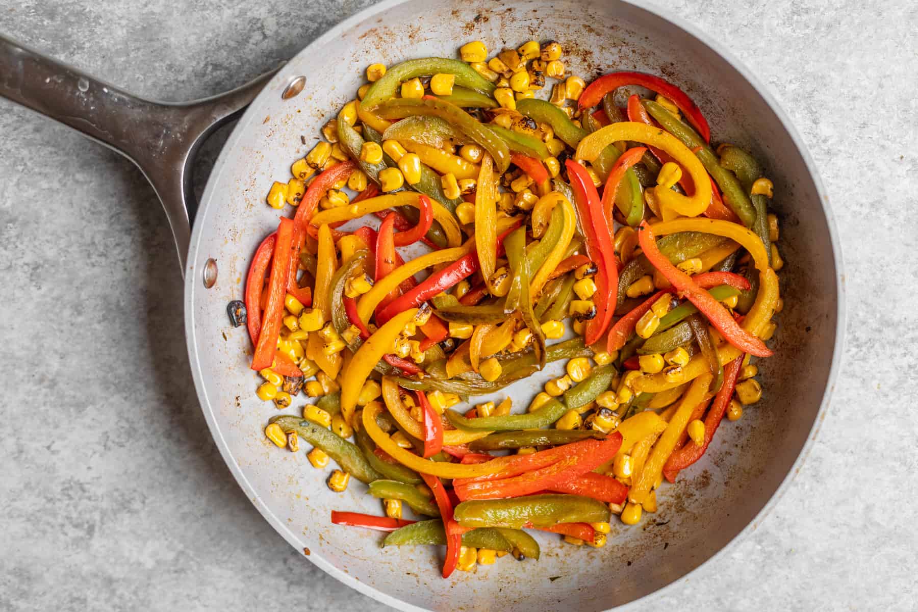 Pepper And Corn In A Saute Pan