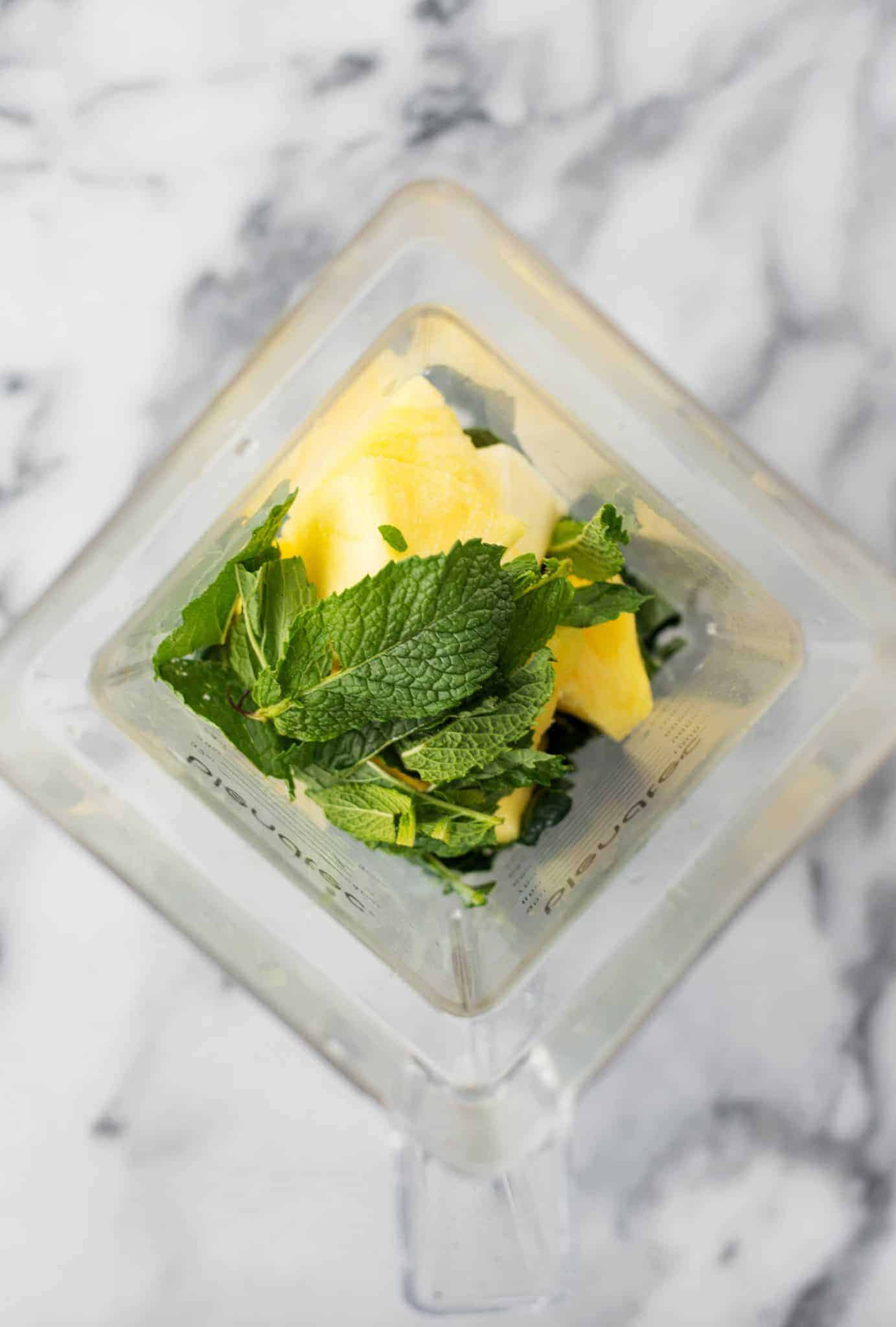 Pineapple Mint Green Drink! Tastes Like A Pineapple Mojito. Mint, Kale, Pineapple And Lime, A Refreshing Juice For Spring And Summer. Vegan And Gluten-Free. | Delishknowledge.com