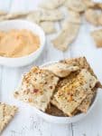 Pizza crackers with homemade pizza hummus! Ready in just 30 minutes! A healthy snack, kid approved! Vegan | delishknowledge.com