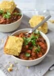 Vegan Pumpkin Chili! This spicy and savory stew is perfect for crisp evenings! Black beans and vegetables simmered in a rich pumpkin chili sauce. #Vegan & #Glutenfree | www.delishknowledge.com