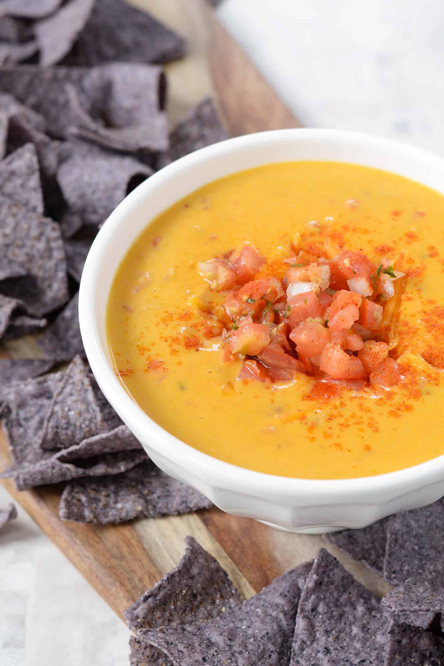 Pumpkin Chipotle Queso Dip! Looking for a unique appetizer? Try this dip! Spicy, creamy and perfectly cheesy! #vegetarian #queso #pumpkin #dip #appetizer #snack #holiday #fall #recipe #healthyrecipe #recipeidea | www.delishknowledge.com