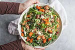 Sweet Potato and Quinoa Salad 58 Hands Holding A Bowl Of Sweet Potato And Quinoa Salad