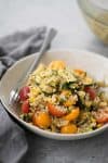 Roasted Zucchini, Corn and Bulgur Salad with Lemon Dressing. This healthy side dish is perfect for summer, potlucks and cookouts. Vegan | delishknowledge.com