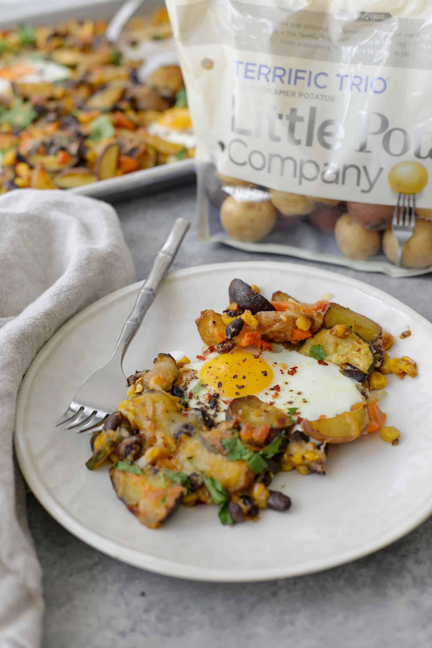 Sheet Pan Breakfast Hash 2 Sheet Pan Breakfast Hash! You Are Going To Love This Quick And Easy Dinner (Or Breakfast) Idea. Roasted Potatoes, Zucchini, Peppers, Beans, Corn And Eggs. High-Protein, Vegetarian And Gluten-Free. | Www.delishknowledge.com