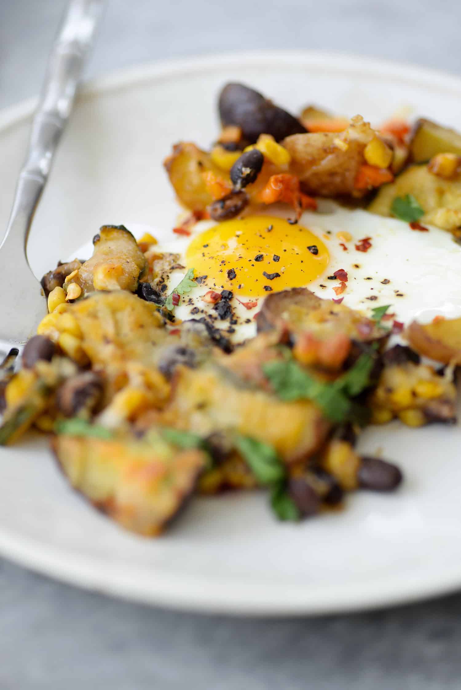 Sheet Pan Breakfast Hash 7 Sheet Pan Breakfast Hash! You Are Going To Love This Quick And Easy Dinner (Or Breakfast) Idea. Roasted Potatoes, Zucchini, Peppers, Beans, Corn And Eggs. High-Protein, Vegetarian And Gluten-Free. | Www.delishknowledge.com
