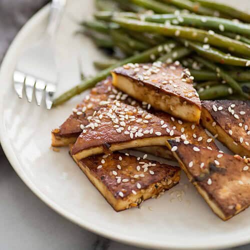 Sheet Pan Spicy Tofu and Green Beans + Video 7 Sheet Pan Spicy Tofu And Green Beans! You Are Going To Love This One Pan Meal. Spicy Tofu With Crispy Green Beans. Vegan And Gluten-Free, A Must-Make! | Www.delishknowledge.com