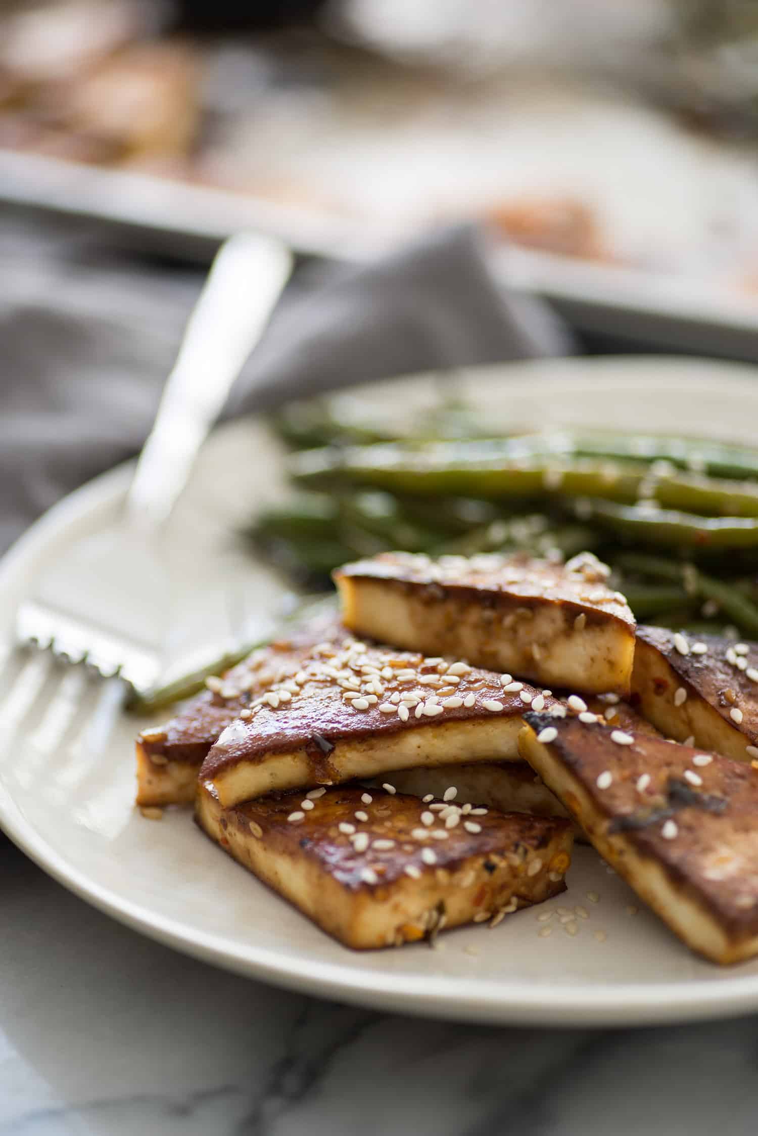 Sheet Pan Spicy Tofu And Green Beans! You Are Going To Love This One Pan Meal. Spicy Tofu With Crispy Green Beans. Vegan And Gluten-Free, A Must-Make! | Www.delishknowledge.com