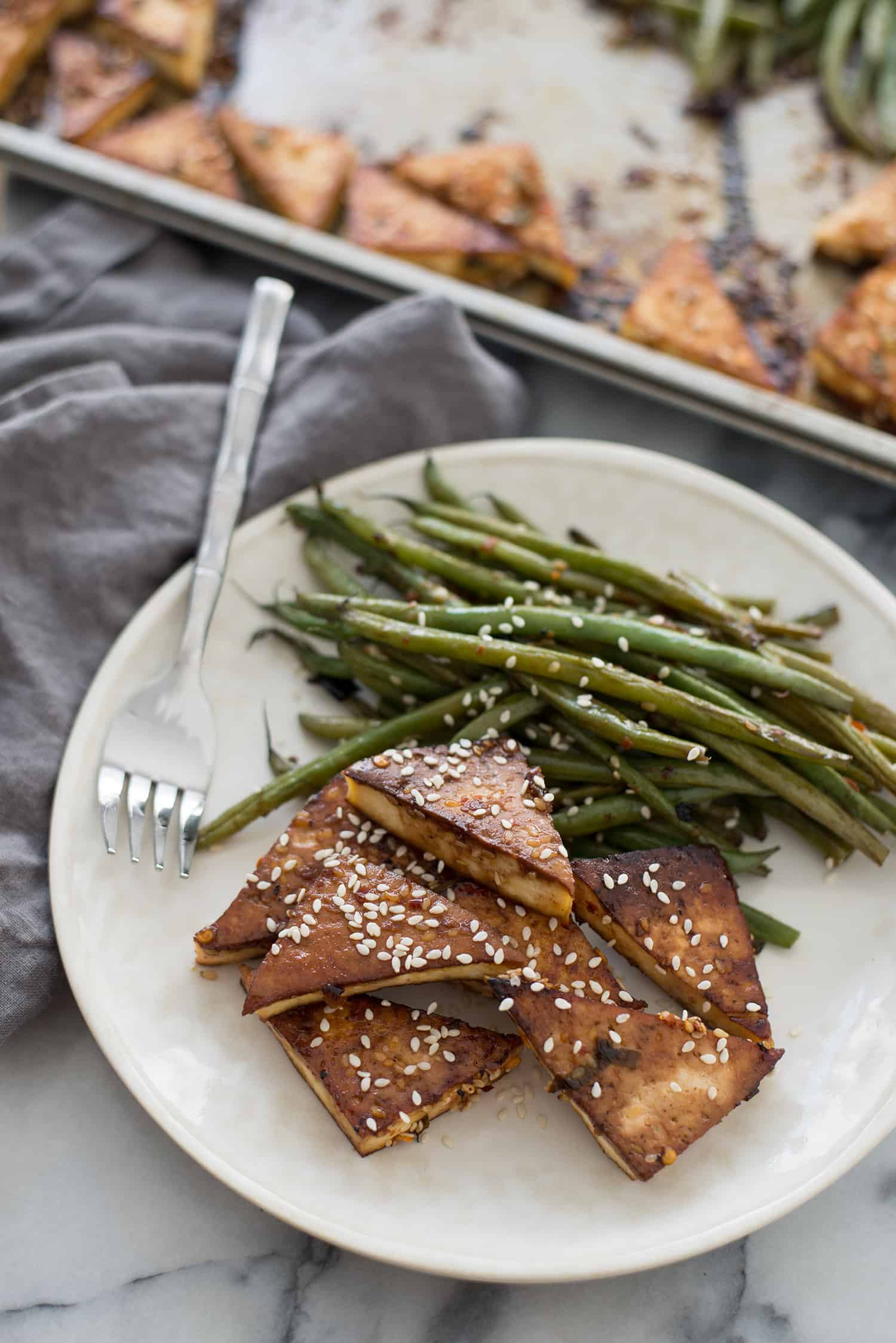 Sheet Pan Spicy Tofu And Green Beans! You Are Going To Love This One Pan Meal. Spicy Tofu With Crispy Green Beans. Vegan And Gluten-Free, A Must-Make! | Www.delishknowledge.com