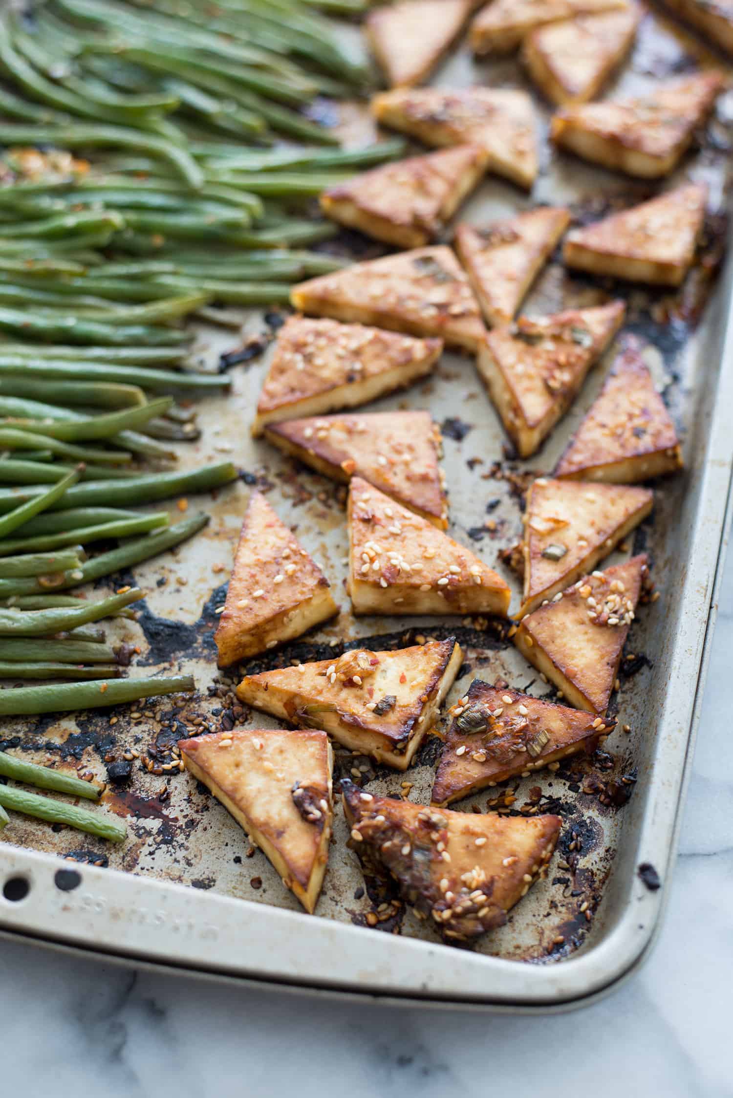 Sheet Pan Spicy Tofu And Green Beans! You Are Going To Love This One Pan Meal. Spicy Tofu With Crispy Green Beans. Vegan And Gluten-Free, A Must-Make! | Www.delishknowledge.com