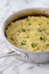 Vegan Skillet Shepherd's Pie! Have leftover mashed potatoes? Make this recipe! Stove-top stew of vegetables and mushrooms covered in mashed potatoes. A perfect vegan and gluten-free comfort dinner. | www.delishknowledge.com
