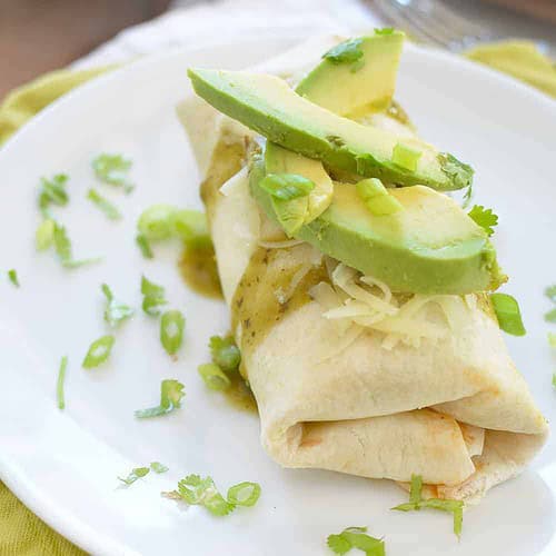 Slow Cooker Breakfast Burritos 7 Slow Cooker Breakfast Burritos! Make It At Night For A Healthy Breakfast In The Morning. These Are #Vegetarian, Easily #Vegan And So Delicious! Save This For Weekend Entertaining For Houseguests!| Www.delishknowledge.com