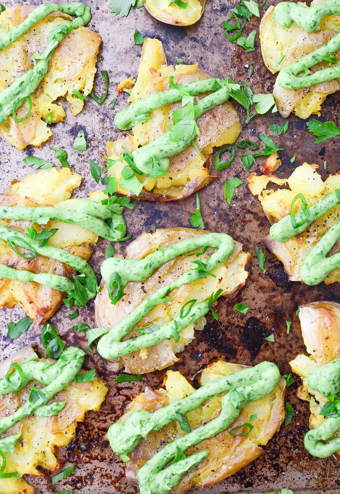 Crispy Smashed Potatoes With Creamy Chimichurri Sauce! You'Ll Want To Bring This To Your Next Cookout Or Potluck! Vegan And Gluten-Free | Www.delishknowledge.com