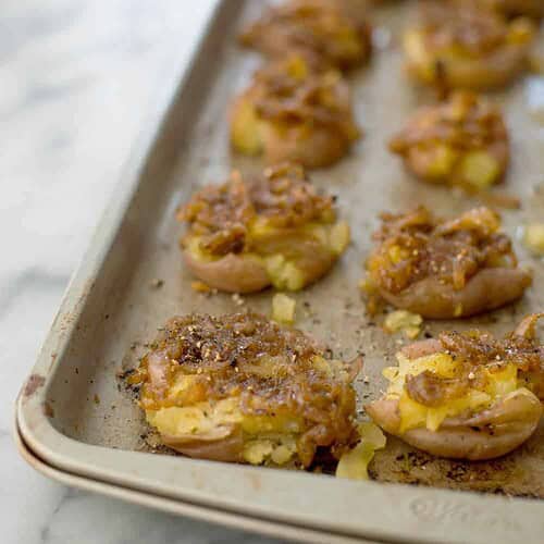 Smashed Potatoes with Shallot Dressing 6 Smashed Potatoes With Shallot Dressing! Save This When You Need An Easy Side-Dish For The Holidays. Ready In Less Than 30 Minutes! Smashed, Crispy Potatoes Topped With Buttery Shallot Dressing. Vegan And Gluten-Free. | Www.delishknowledge.com