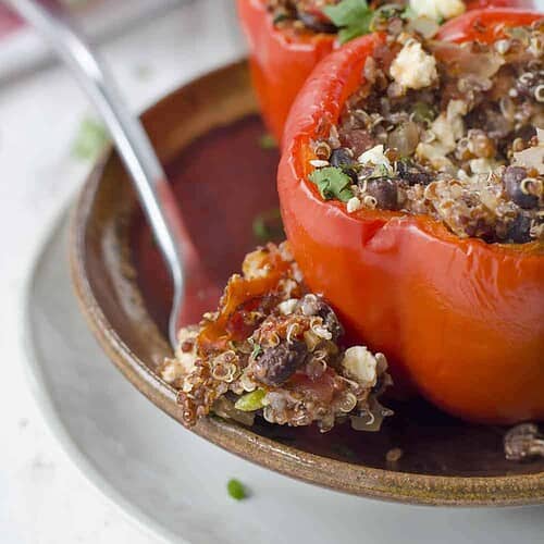Southwestern Quinoa Stuffed Peppers! Vegetarian And Gluten-Free! These Protein Packed Peppers Are So Easy To Put Together And Perfect For Busy Weeknights. Save These To Make Later! | Www.delishknowledge.com