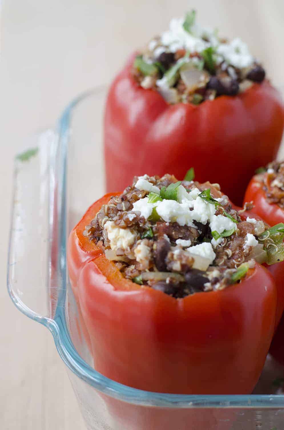 Southwestern Quinoa Stuffed Peppers! Vegetarian And Gluten-Free! These Protein Packed Peppers Are So Easy To Put Together And Perfect For Busy Weeknights. Save These To Make Later! | Www.delishknowledge.com