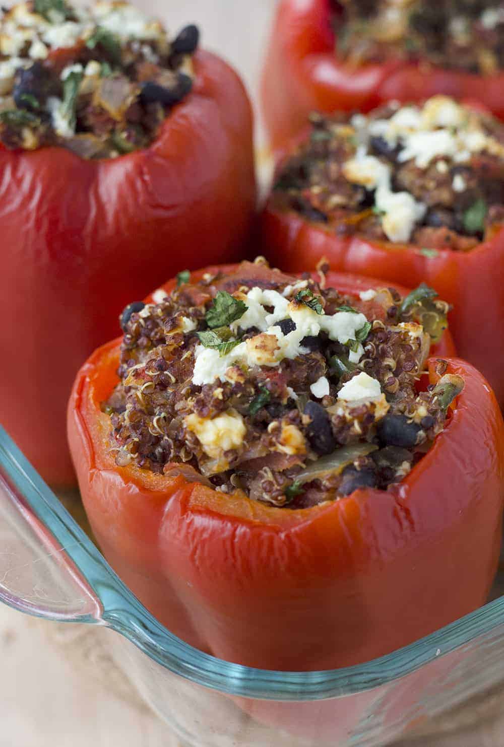 Southwestern Quinoa Stuffed Peppers! Vegetarian And Gluten-Free! These Protein Packed Peppers Are So Easy To Put Together And Perfect For Busy Weeknights. Save These To Make Later! | Www.delishknowledge.com