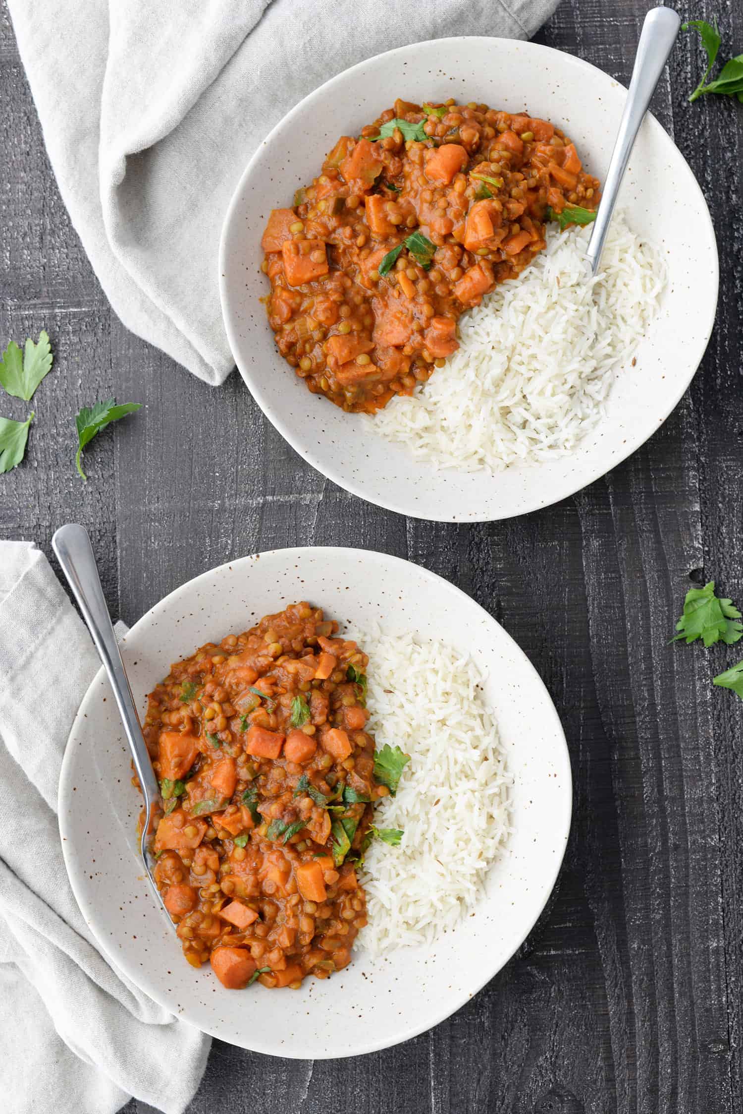 Two Bowls Of Vegan Coconut Curry Lentils 