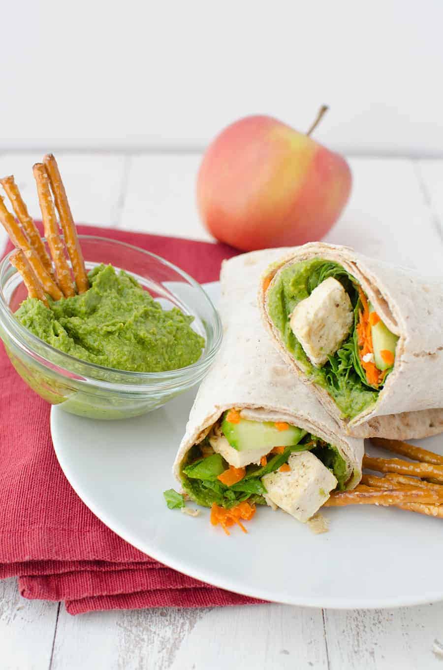 Spinach Hummus! Slightly Spicy Hummus Wrapped Into Whole Wheat Lavish Bread And Topped With Veggies And Lightly Fried Tofu. Healthy And Filling Lunch!