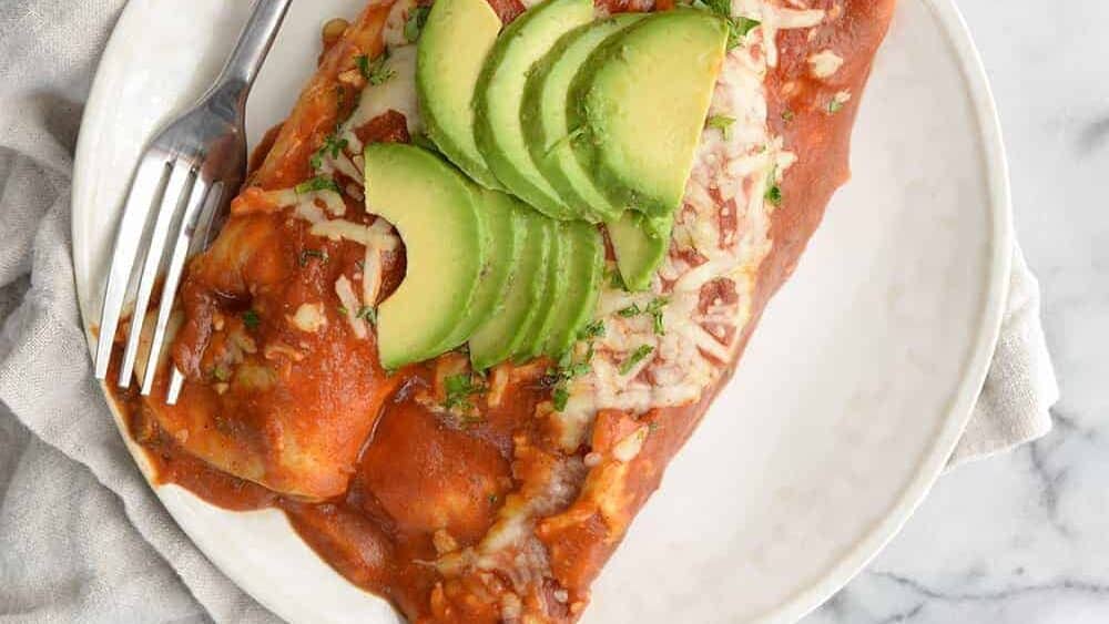 plate of spinach and lentil enchiladas