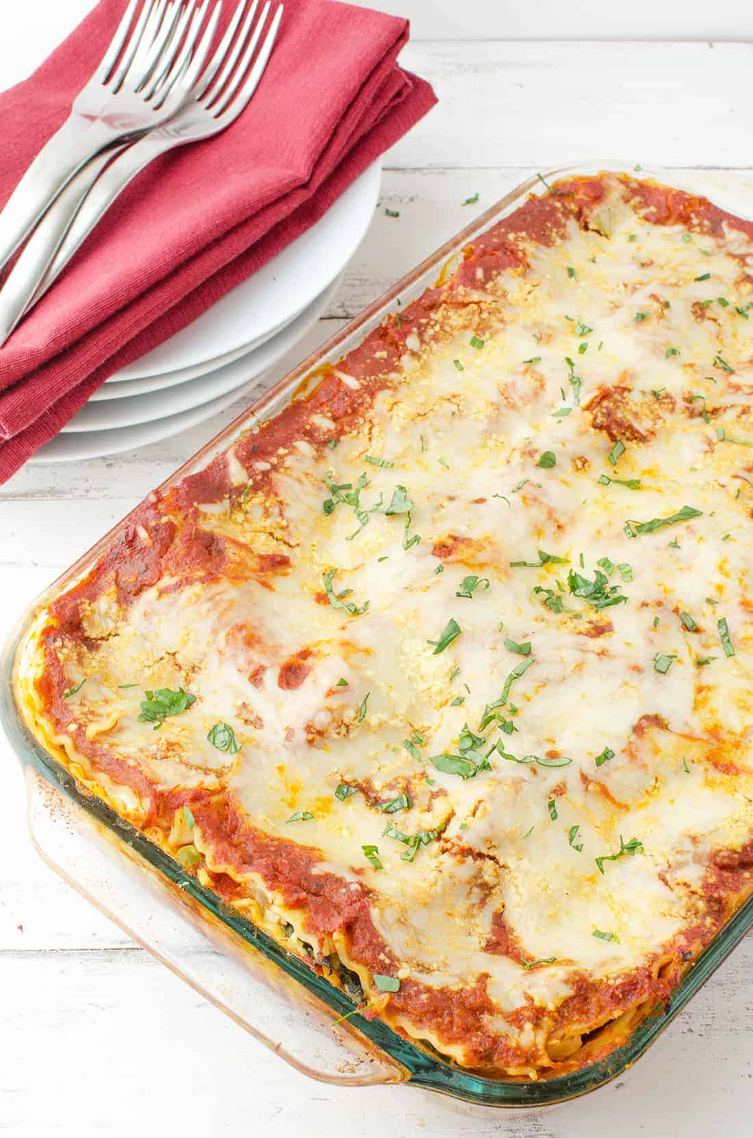 Spring Vegetable Lasagna! Layers Of Zucchini, Spinach, Peas And Creamy Ricotta. Less Than 350 Calories Per Huge Slice. #Vegetarian | Delishknowledge.com