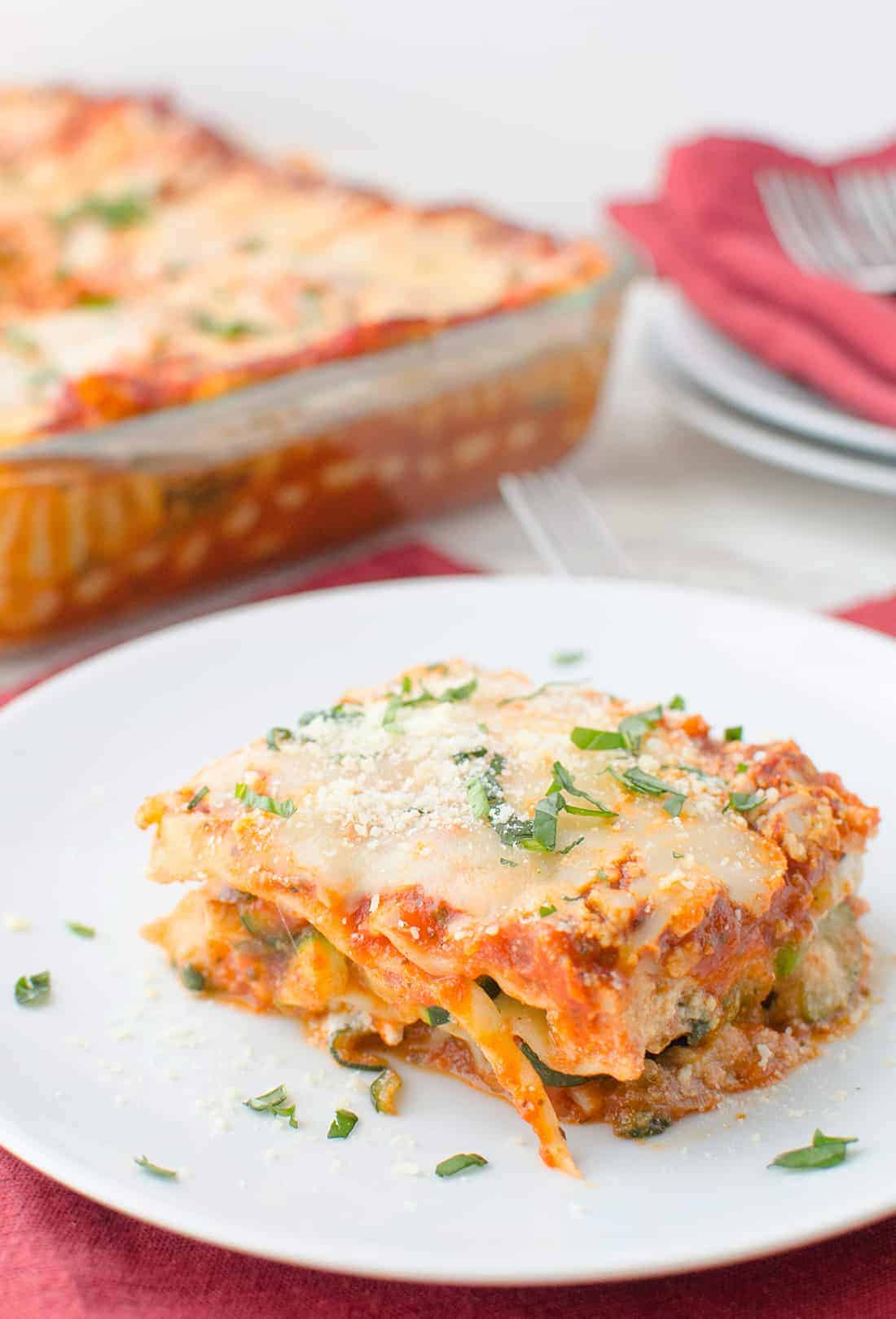 Spring Vegetable Lasagna! Layers Of Zucchini, Spinach, Peas And Creamy Ricotta. Less Than 350 Calories Per Huge Slice. #Vegetarian | Delishknowledge.com