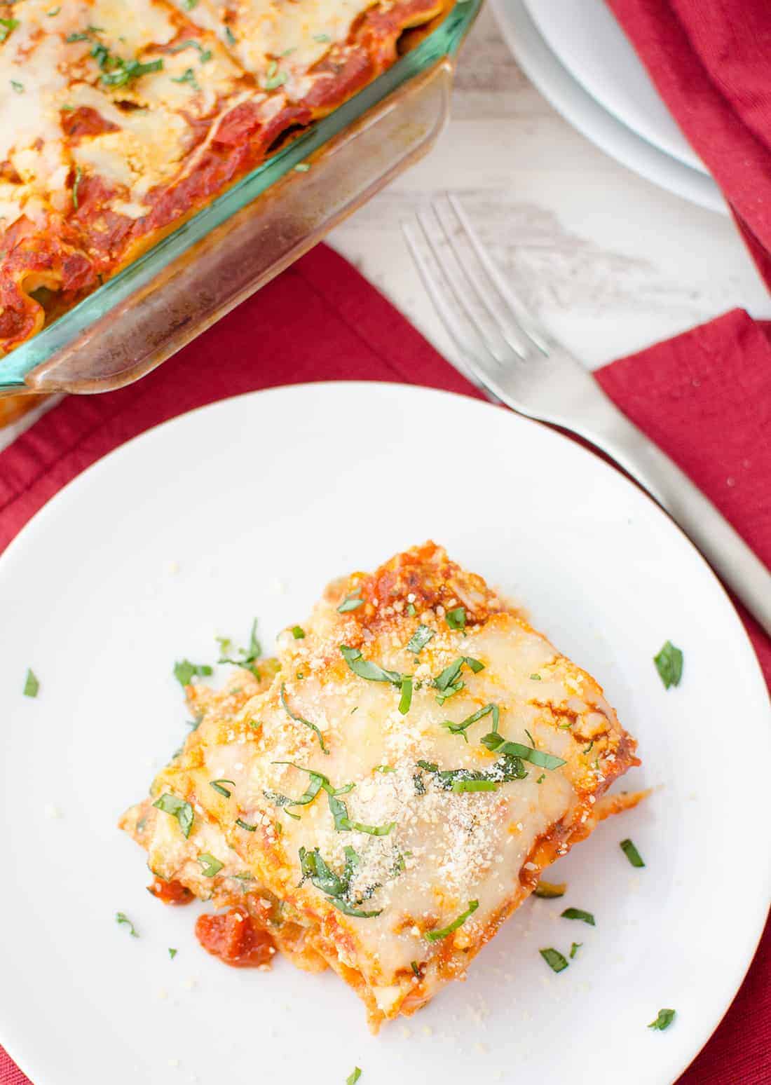 Spring Vegetable Lasagna! Layers Of Zucchini, Spinach, Peas And Creamy Ricotta. Less Than 350 Calories Per Slice. #Vegetarian | Delishknowledge.com