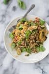 Squash and Quinoa Salad! This side dish is perfect for summer or dinners. Roasted zucchini, squash and tomatoes with quinoa and a lemon-basil dressing. Vegan and GlutenFree | www.delishknowledge.com