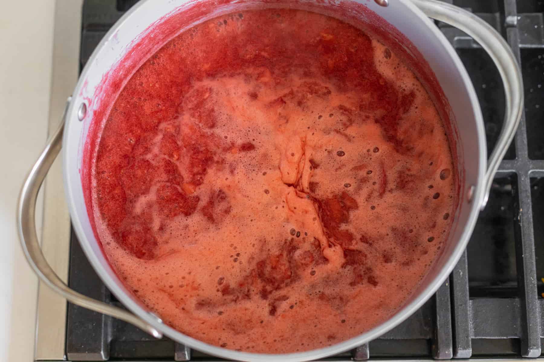 Boiling Strawberry Preserves For Jam