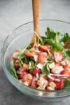 Strawberry Kale Salad with Lavender Dressing. You've gotta try this healthy salad, perfect for summer! This lavender-poppy seed dressing is so delicious, it's great on everything. Vegetarian and Gluten-free | www.delishknowledge.com